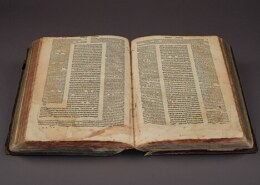 What is the difference between the Talmud and the Torah in Judaism?